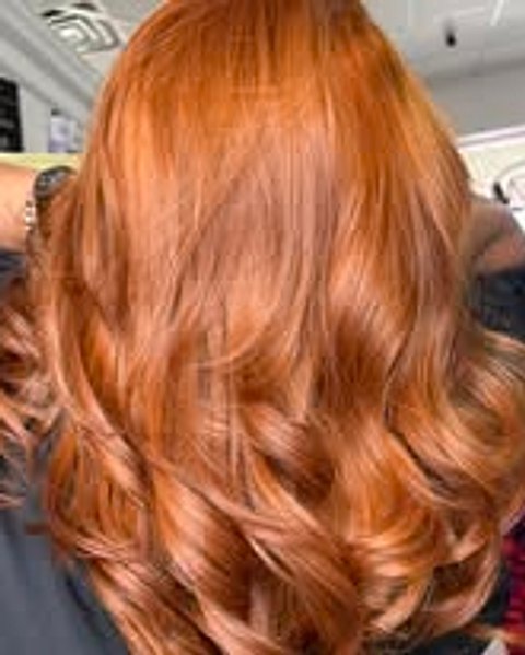 Copper red color with soft curled ends